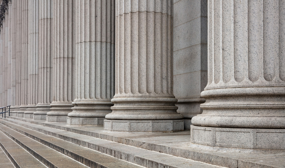 The pillars outside of a courthouse in El Paso.